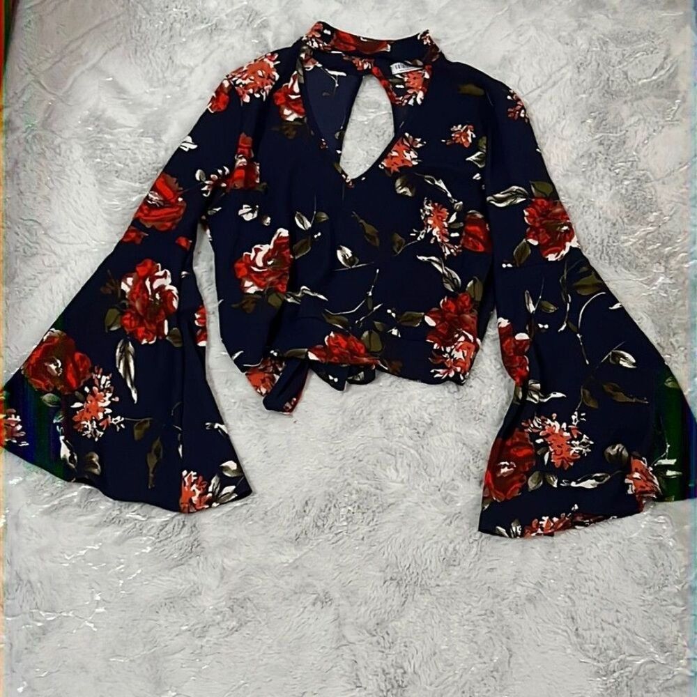 Navy floral bell sleeve with v neck and tie back